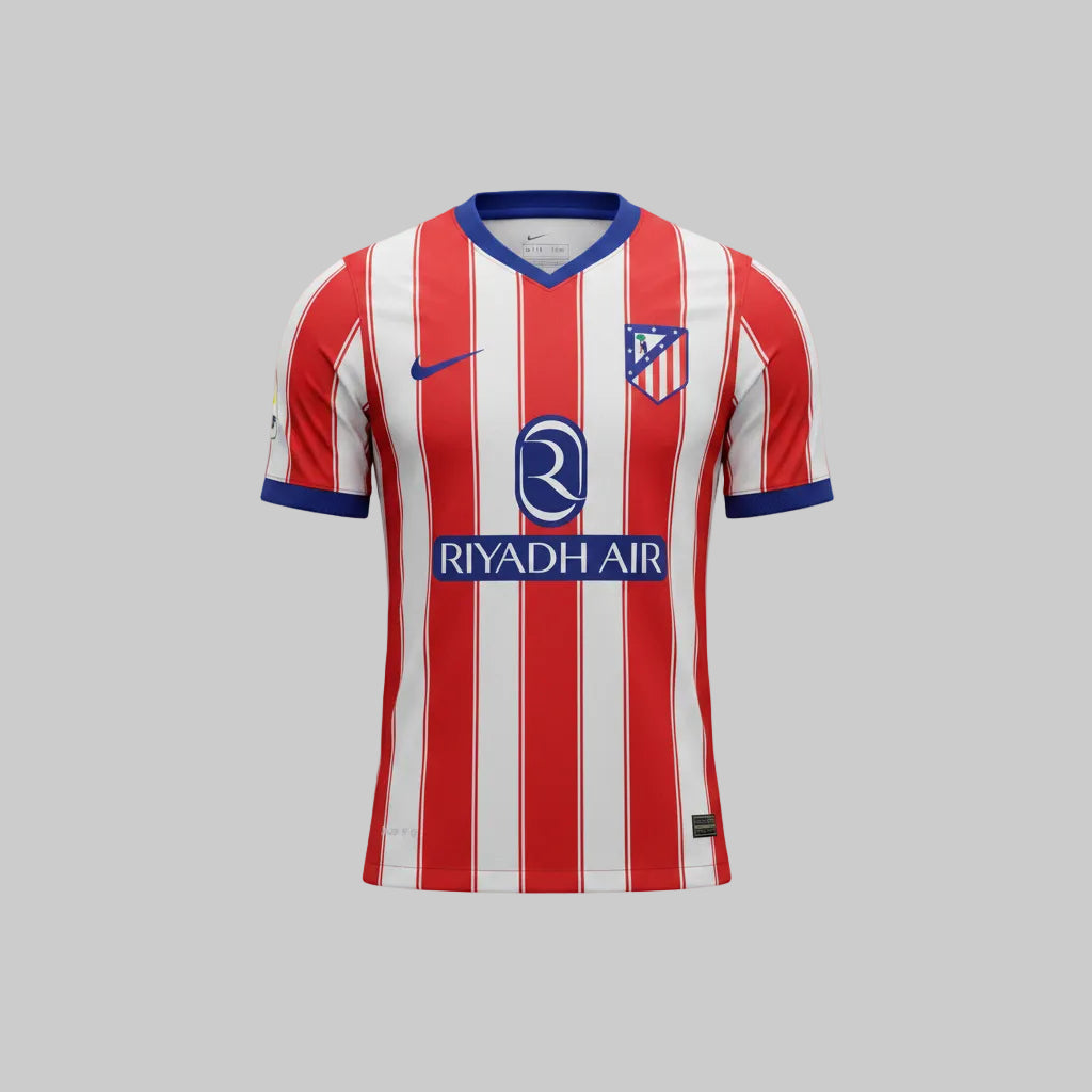 A red and white vertically striped Atletico Madrid soccer jersey displayed on a black mannequin torso against a dark gray background. The jersey features blue trim on the collar and cuffs, a blue Nike swoosh on the right chest, the Atletico Madrid crest on the left chest, and a large blue sponsor logo 'RIYADH AIR' across the center.